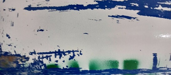 Abstract Blue and Green Paint Strokes on White Surface