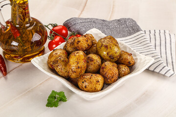 Baked mini potato with herbs