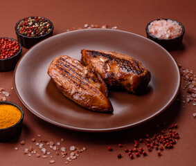 Chicken breast, grilled fillet, meat meal on a plate. Grilled poultry for dinner