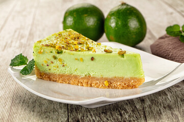 Green pistachio cheesecake served mint