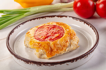 Chicken chop cutlet with cheese and tomato