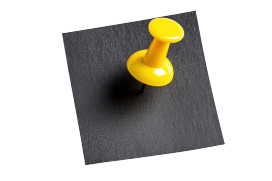 Yellow Push Pin Attached to Black Surface in High-Quality Image