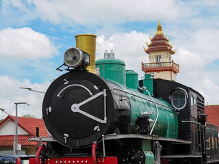 Old Steam Locomotive at Chiangmai railway station in day time,North of Thailand
