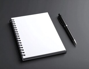 Blank notebook and pen on dark surface