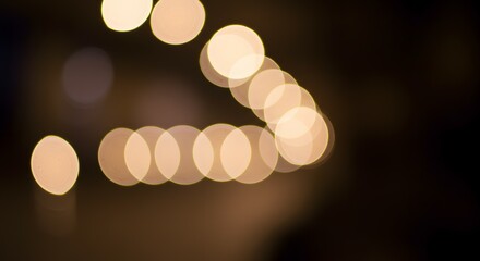 Abstract Warm-Toned Bokeh Lights Background Soft Focus, Golden Glow, Night Photography