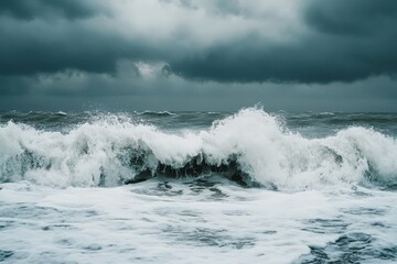 Stormy sea waves crashing on beach under moody clouds during turbulent weather conditions, Rough sea waves on beach Moody and stormy weather