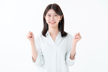 ガッツポーズをする女性