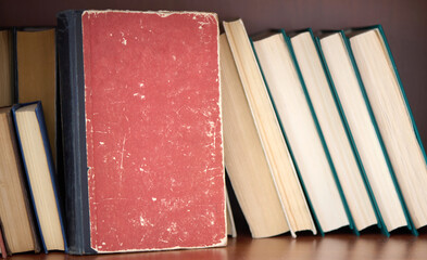 Old book with copy space on a bookshelf. Home library
