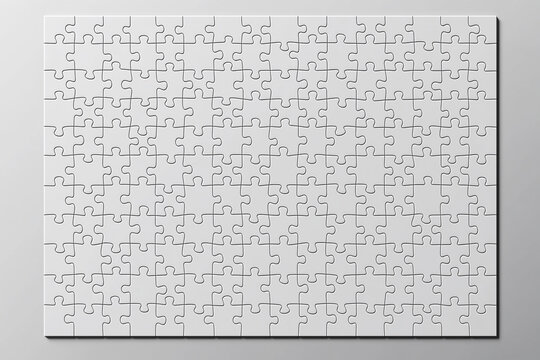 Blank jigsaw puzzle with white pieces on gray background