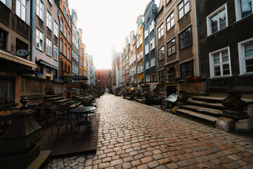 Fototapeta premium Gdansk with Motlawa river in Poland. Old town colourful house with church and Mariacka street
