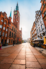 Fototapeta premium Gdansk with Motlawa river in Poland. Old town colourful house with saint Marys church i main square..
