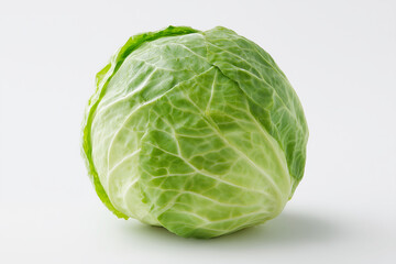 Fototapeta premium A large green cabbage sits on a white background. The cabbage is the main focus of the image, and it is fresh and healthy. The white background emphasizes the vibrant green color of the cabbage