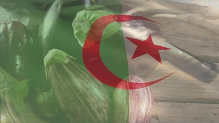 Starting overlay, Algerian flag shifting and fading above vegetable bowl highlighting cuisine - Powered by Adobe
