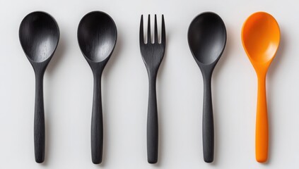 Stylish Black and Orange Wooden Spoons and Fork Set Flat Lay Kitchen Utensils