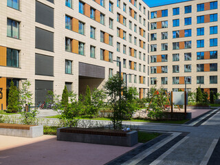 A Modern Apartment Complex featuring a lovely Green Courtyard and Innovative Architectural Design