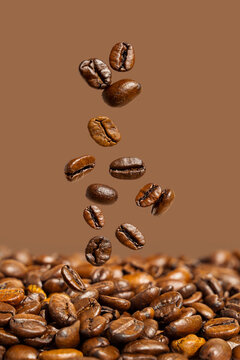 Closeup coffee beans levitating, abstract concept