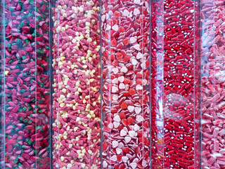 A vibrant mix of rainbow-colored candies.