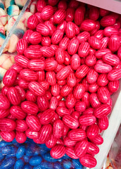 A vibrant mix of rainbow-colored candies.
