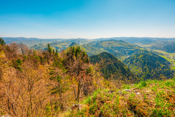 Hiking to peak Tri Koruny or Trzy Korony during day. Pieniny National park in Poland. View from the lookout at the top.