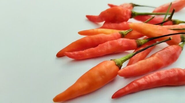 cayenne pepper (cabe rawit) on a white background. This cayenne pepper or cabe rawit is famous for its very high level of spiciness.
