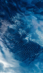 Abstract textured blue background with flowing lines creating a dynamic and refreshing impression design