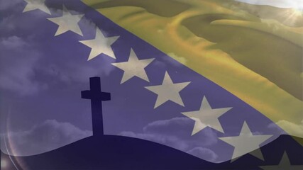 Flag fading in and waving over cross, clouds drifting and sunbeams shining evoking dawn remembranc - Powered by Adobe