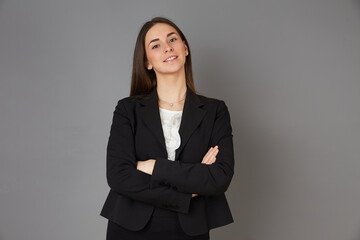young businesswoman posing in studio background