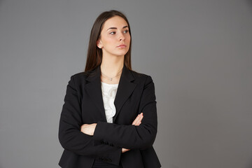 young businesswoman posing in studio background