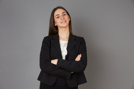 young businesswoman posing in studio background