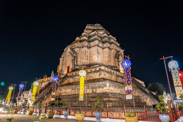 Beautiful large ancient pagoda in night time at Wat Chedi Luang Varavihara Temple, Chiang Mai,...