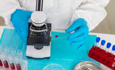 examine blood in the laboratory. Selective focus.
