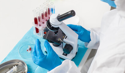 examine blood in the laboratory. Selective focus.