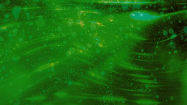 abstract green background with particles