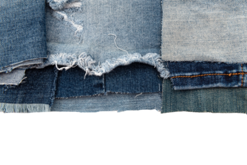 Piece of torn denim on a white background. Denim texture