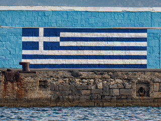 Greek flag mural on Sitia's port wall