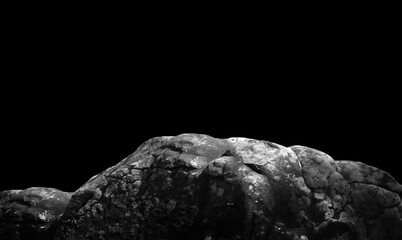 Stone podium on dark black background..