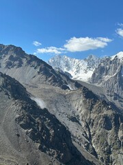 Kyrgyzstan, Ala Archa, Komsomolets Peak, incredible views of mountain peaks like the Alps in Europe, mountain climbing, clouds over rocks, slopes in clouds, wallpaper on desktop