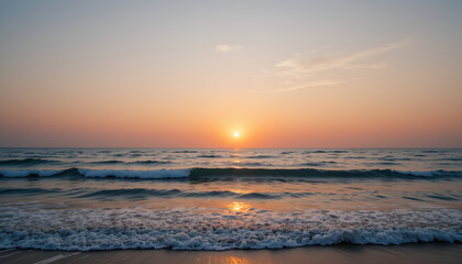 Serene ocean sunset view with gentle waves rolling onto sandy beach creating a peaceful coastal scene perfect for travel and nature lovers.