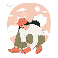 Woman planting a tree in the garden for nature conservation