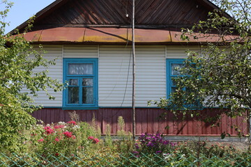 old house with flowers