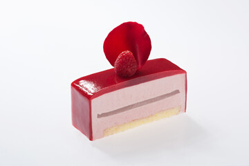 Elegant Raspberry Rose Layered Mousse Cake with Red Glaze and Petal Garnish