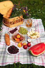 Colorful Summer Picnic with Fruit, Cheese, and Wine
