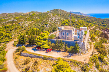 Aerial view of the Napoleon Fortress on Hvar Island, Croatia, perched on a hilltop above the town of Hvar, offering panoramic views of the Adriatic Sea, and Pakleni Islands