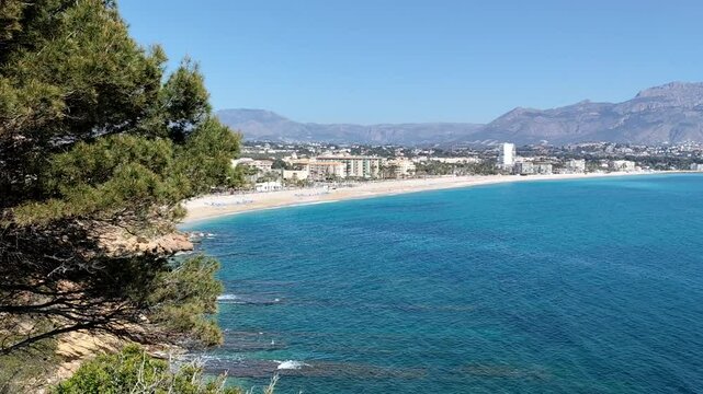 Beach town El Albir in Alfaz del Pi municipality of Alicante Province, Valencian Community in Spain. Costa Blanca region holiday town. View in April.