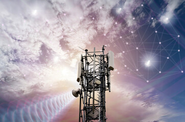 Close-up of a mobile phone antenna in the evening sky with beautiful light atmosphere. The Global...
