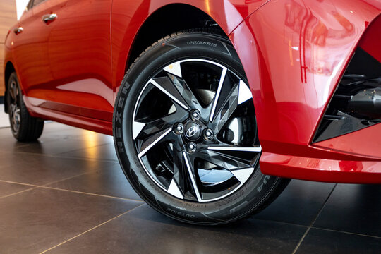 car on the showroom red Hyundai Solaris detail logo