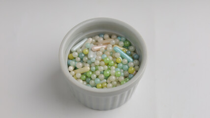 Colorful sprinkles with various shape on white background
