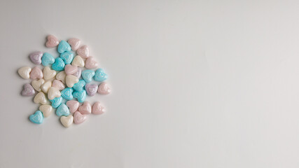 Colorful sprinkles with various shape on white background