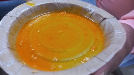 Yellow sweet chutney without samosas,sweet samosa Yellow chutneys,sweet samosa yellow chutney in paper plate,