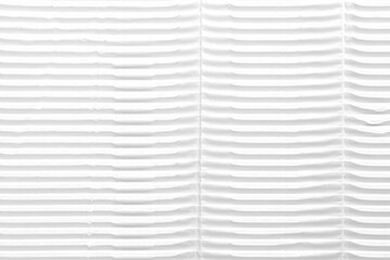 White folded ribbed corrugated wrapping paper. Textured rough cardboard surface. Abstract...